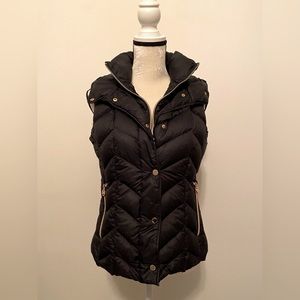 Michael Kors lightweight down filled puffy vest with hood.